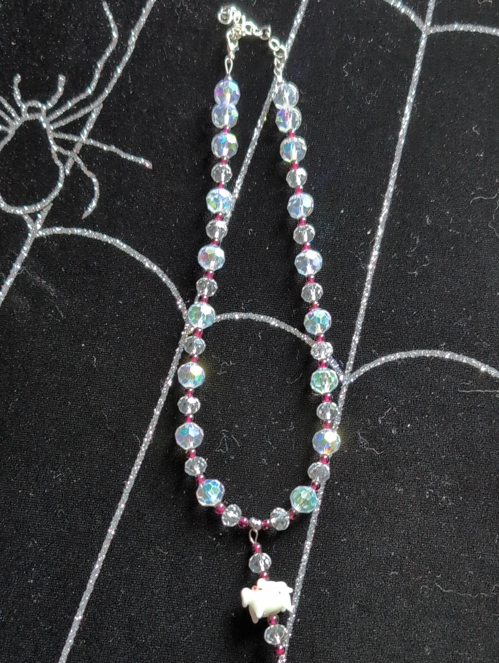 Iridescent Crystal Glass Bead Necklace with White Polka Piggy Glass Pendant